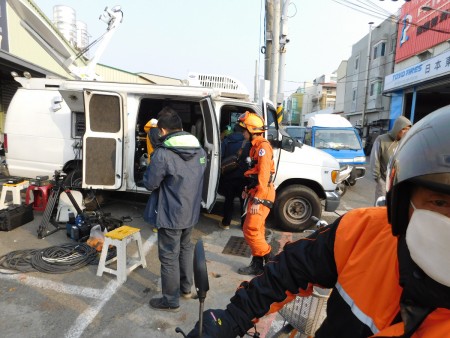 Worker in repelling gear